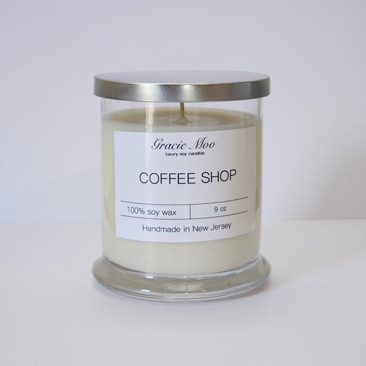 Gracie Moo Candles coffee shop status candle with cozy design, perfect for creating warm ambiance in any space.