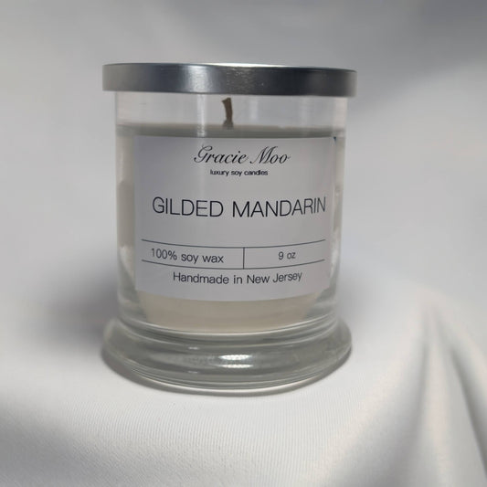 Gilded Mandarin Status Candle by Gracie Moo Candles, featuring a luxurious gold finish and elegant design.