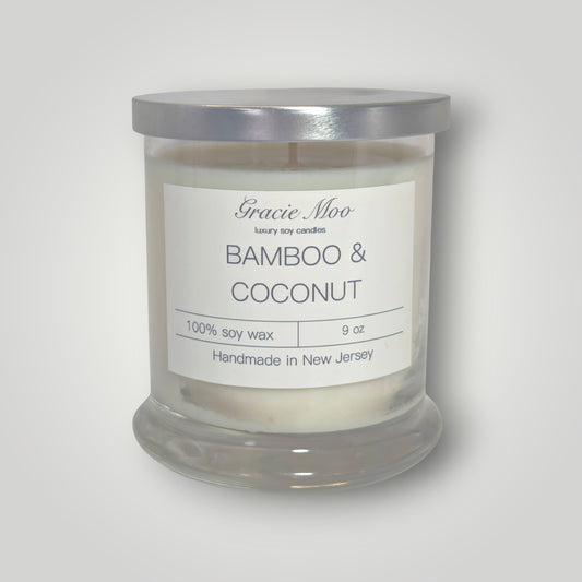 Bamboo and coconut scented candle from Gracie Moo Candles, with a natural bamboo and coconut design in a glass jar.
