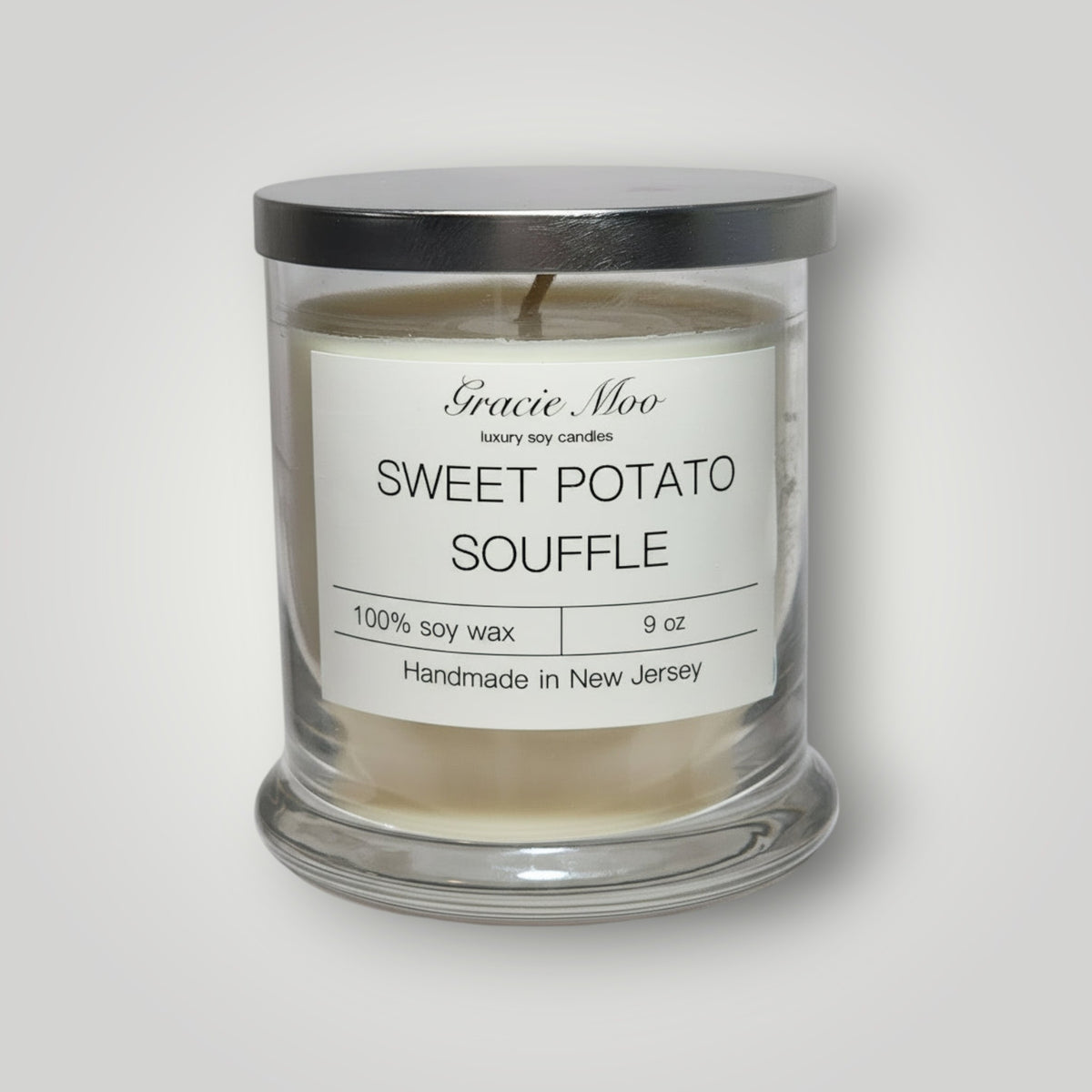 Sweet Potato Soufflé candle by Gracie Moo Candles, showcasing a warm, inviting design in a glass jar.
