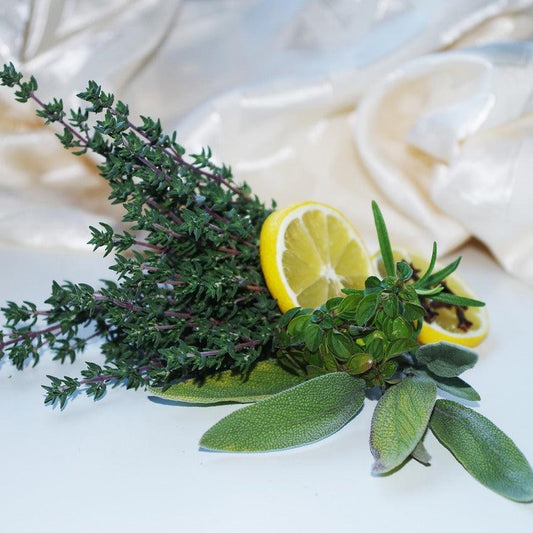 Gracie Moo Candles Rosemary Sage Status Candle with a simple glass holder and natural herbal scent.