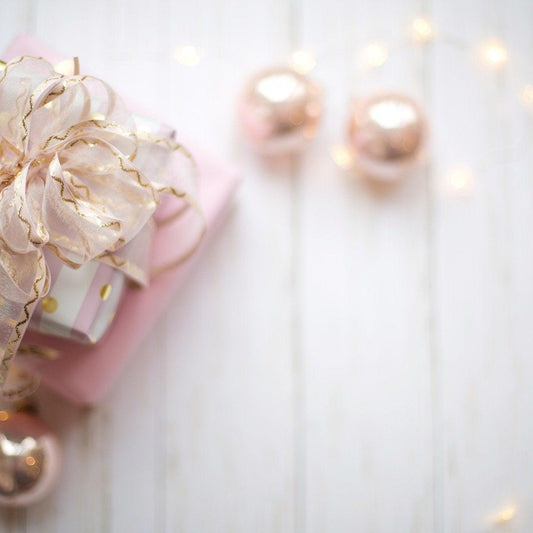Pink gift card for Gracie Moo Candles, featuring elegant branding and decorative design, perfect for candle gift giving.